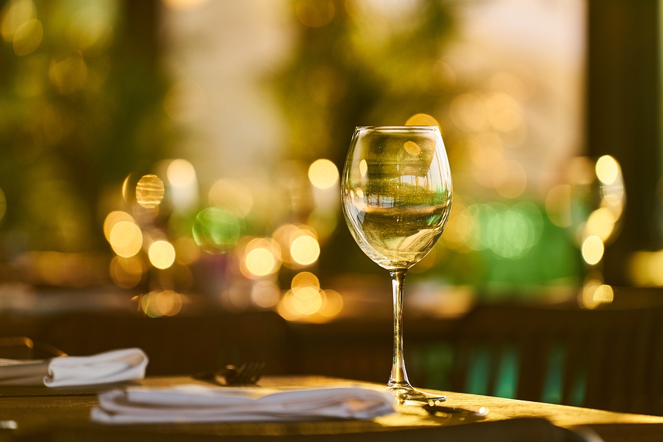 wine glass on a dinner table